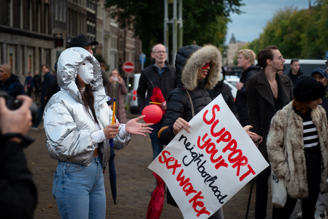 sex-work-advocates-holdinging-up-support-signs