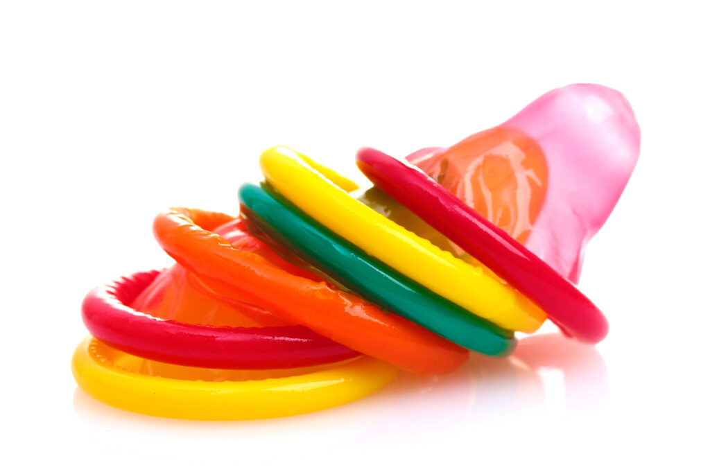 stack-of-multicolored-unwrapped-condoms