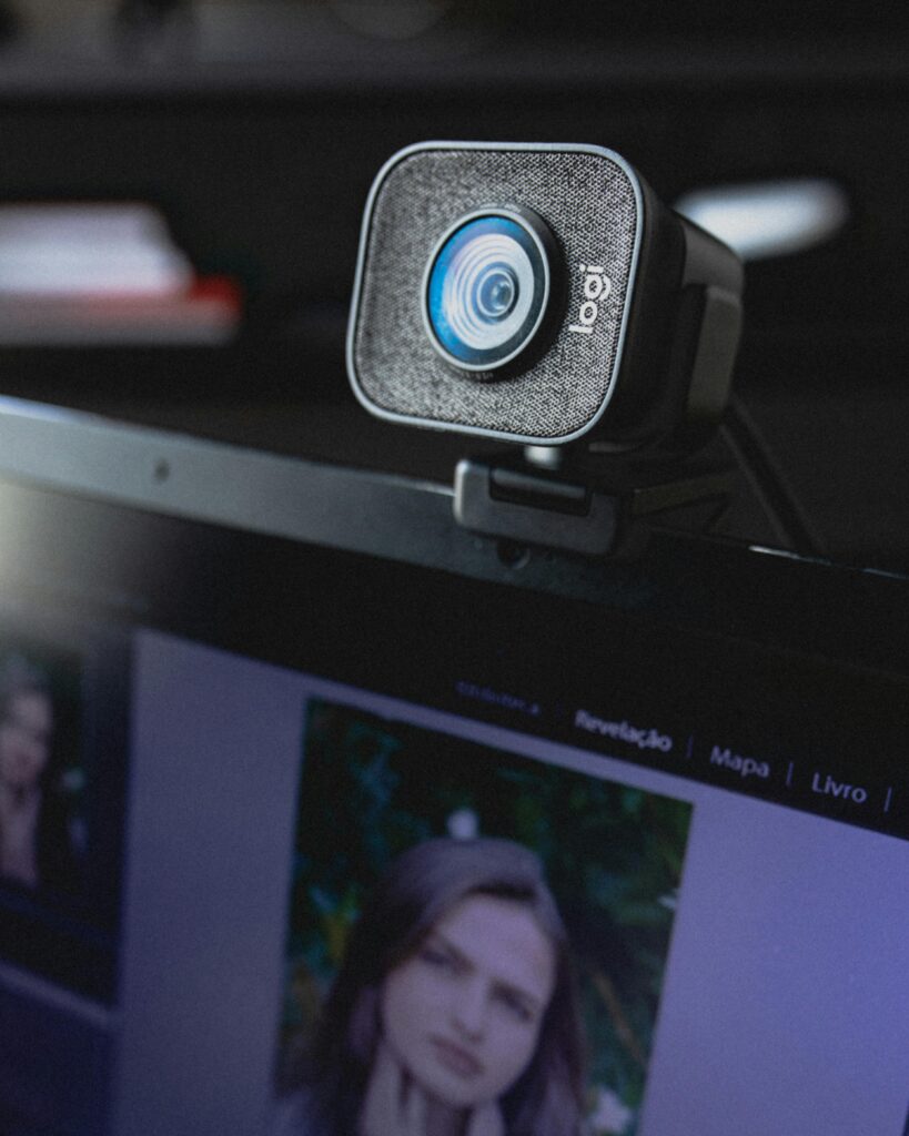 A webcam attached to a laptop. 